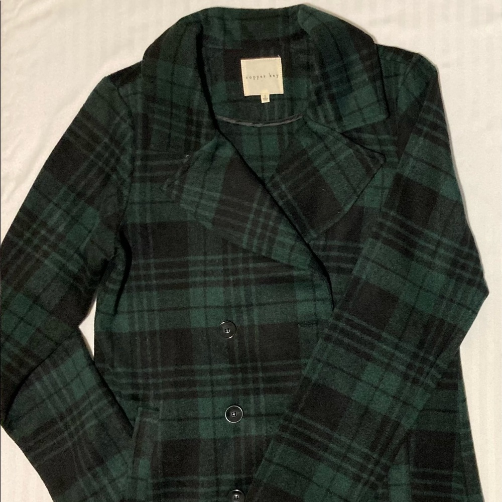 Women’s Jacket in green & black plaid.